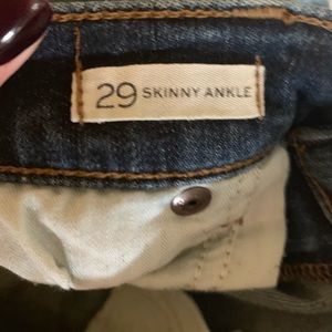 Medium wash skinny ankle jeans